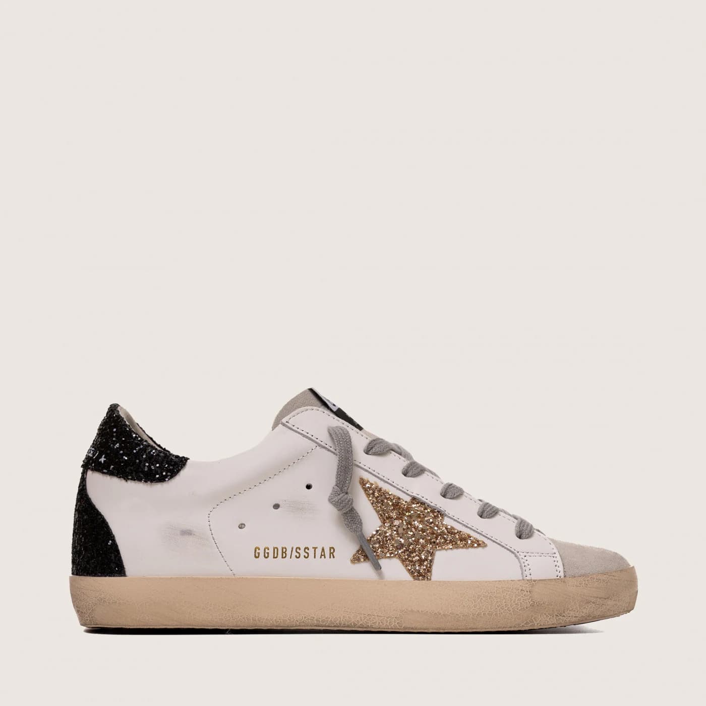 Женские кеды Golden Goose Super-Star / Super-Star Wmns White Silver Black Glitter цена 24 924 ₽ фото и описание в каталоге сайта goldengoose.moscow