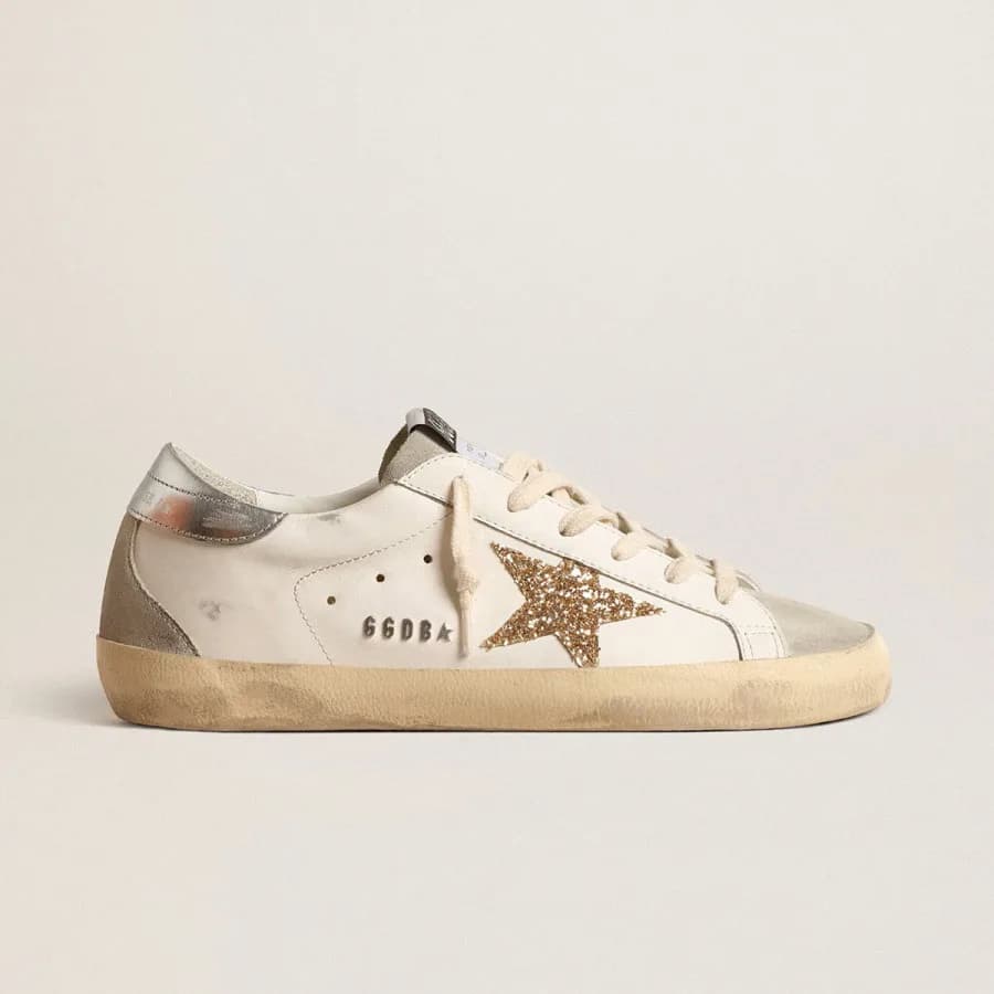 Женские кеды Golden Goose Super Star / Gold glitter star / Золотая звезда цена 24 785 ₽ фото и описание в каталоге сайта goldengoose.moscow