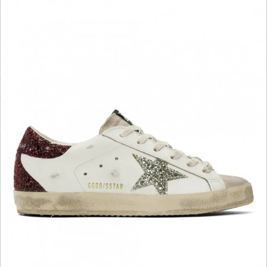Женские кеды Golden Goose Super Star / Silver glitter star borde heel tab / Пламя цена 25 495 ₽ фото и описание в каталоге сайта goldengoose.moscow